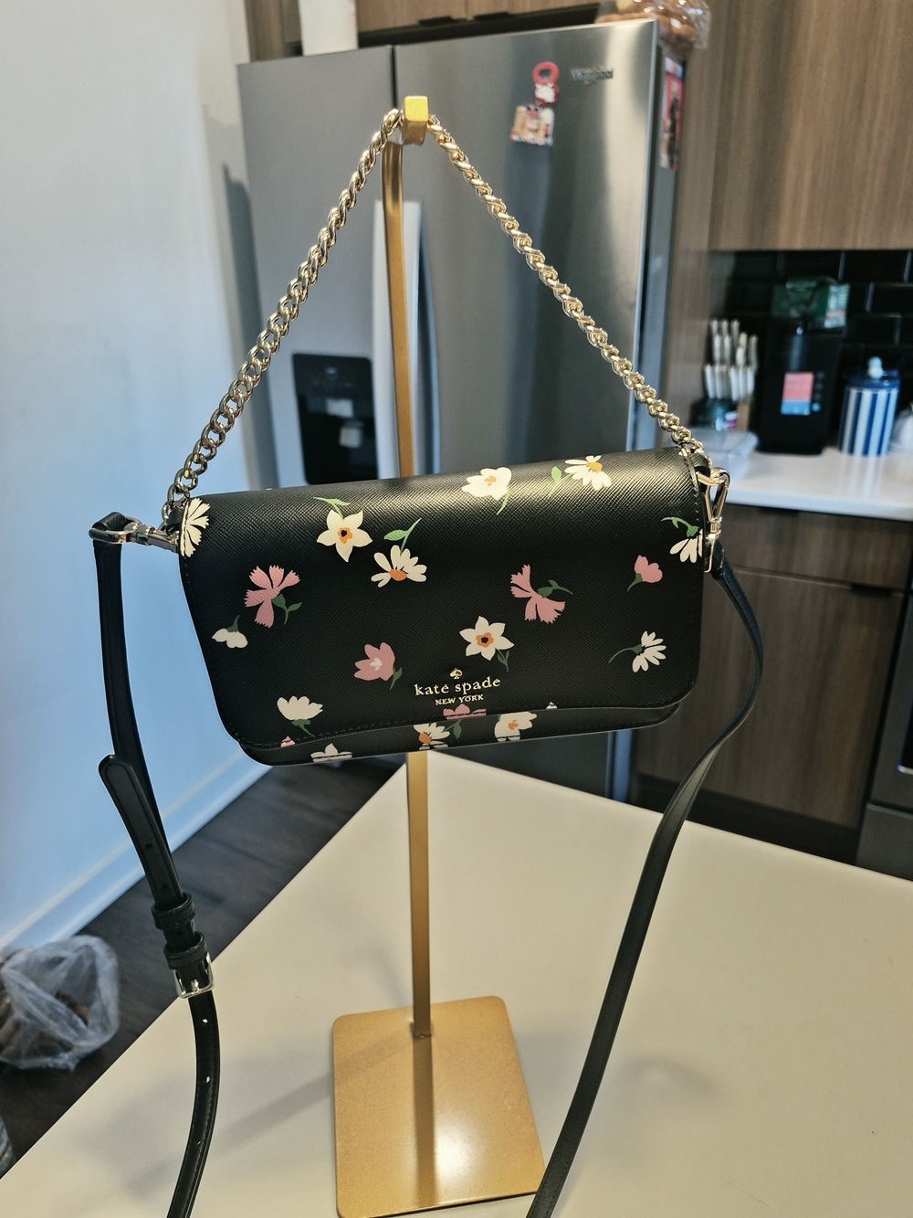 Kate Spade Madison Floral Waltz Flap Convertible Crossbody bag in black multi.